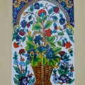 Kafelki na murze przedstawiające kwiaty w wazonie